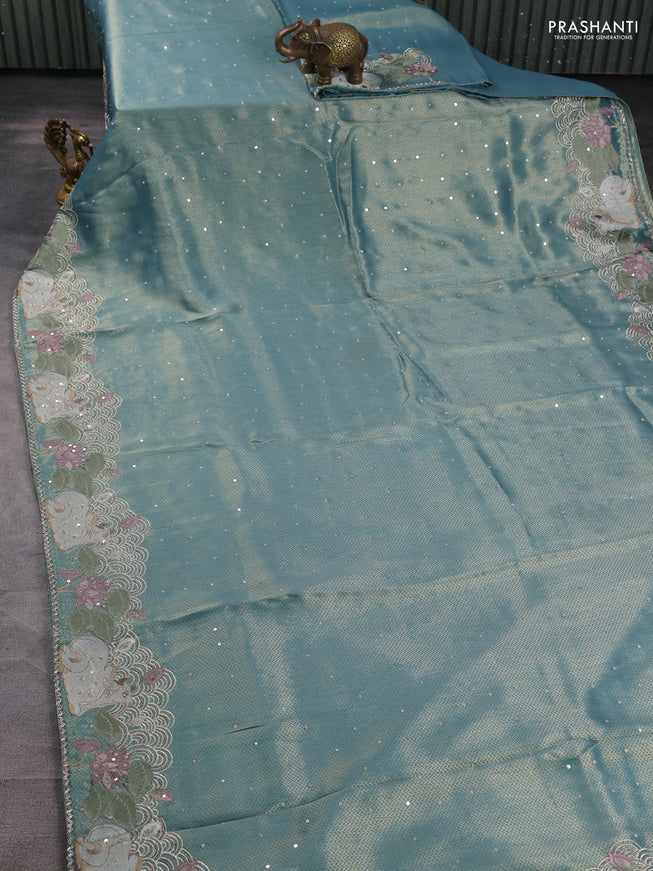 Banarasi silk saree teal blue shade with allover zari weaves & sequin work and embroidery border