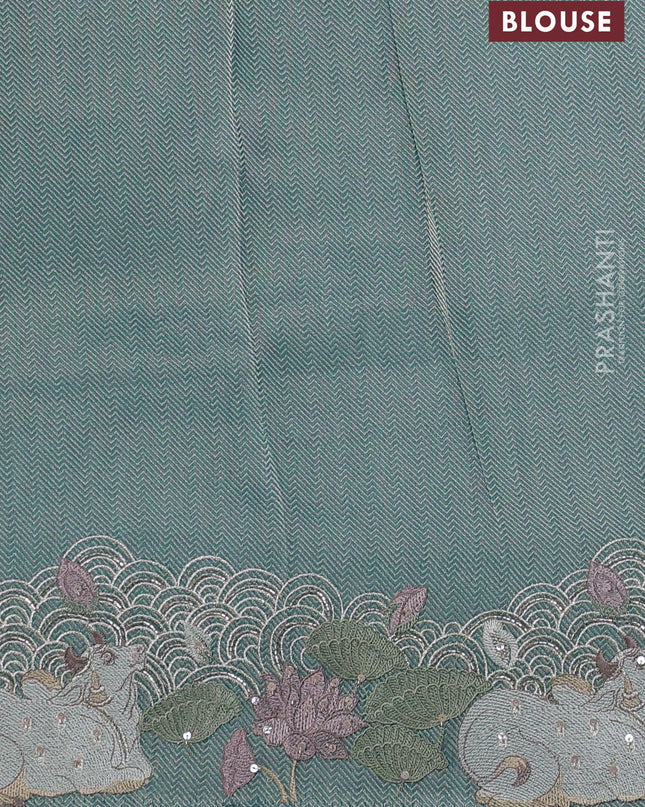 Banarasi silk saree teal blue shade with allover zari weaves & sequin work and embroidery border