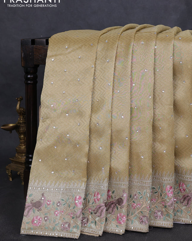 Banarasi silk saree pale yellow with self emboss & sequin work and embroidery border