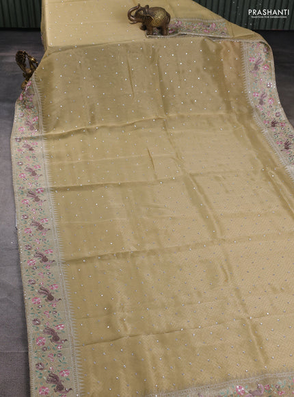 Banarasi silk saree pale yellow with self emboss & sequin work and embroidery border