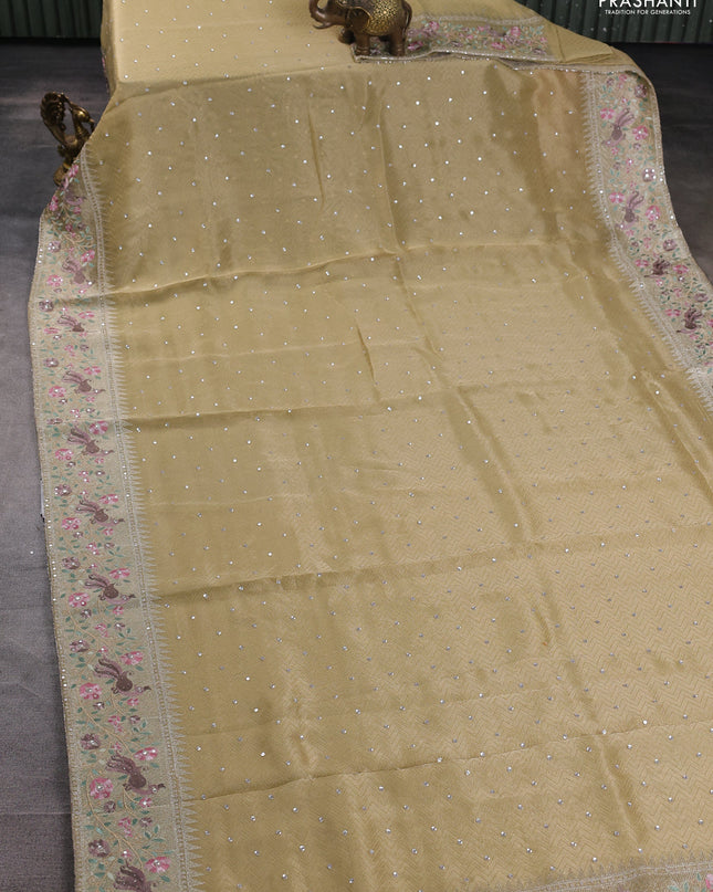 Banarasi silk saree pale yellow with self emboss & sequin work and embroidery border