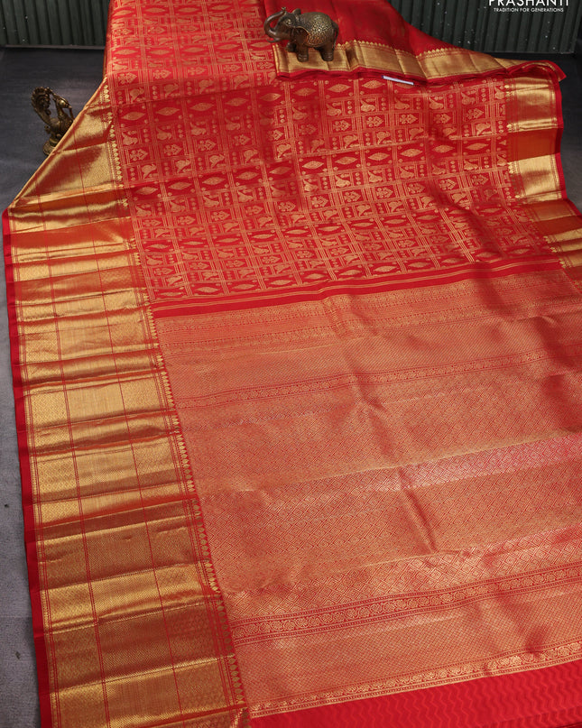 Pure kanchipuram silk saree red with allover zari checks & buttas and long zari woven border