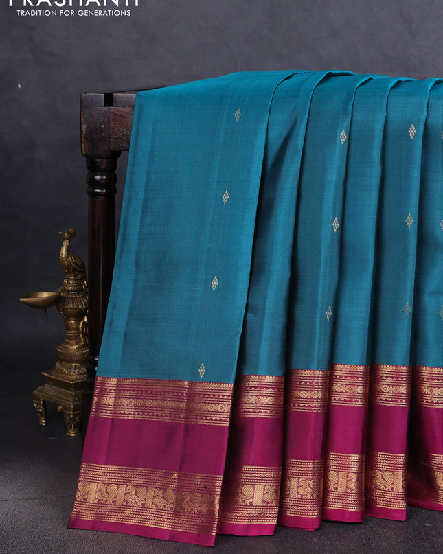 Pure soft silk saree peacock green and magenta pink with zari woven buttas and rettapet zari woven border