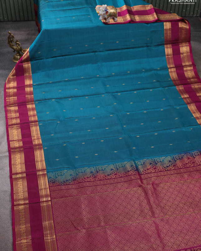 Pure soft silk saree peacock green and magenta pink with zari woven buttas and rettapet zari woven border