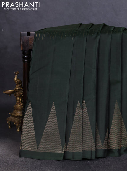Pure soft silk saree bottle green with zari weaves and temple design zari border