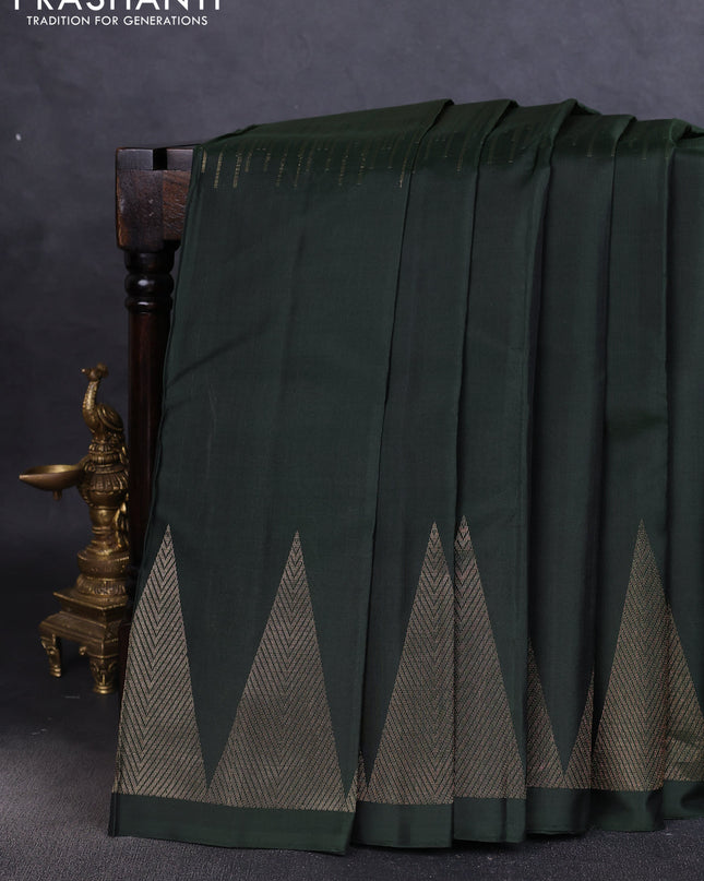 Pure soft silk saree bottle green with zari weaves and temple design zari border