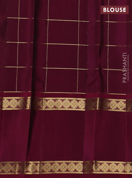 Pure soft silk saree green and magenta pink with allover zari checks & buttas and rettapet zari woven border