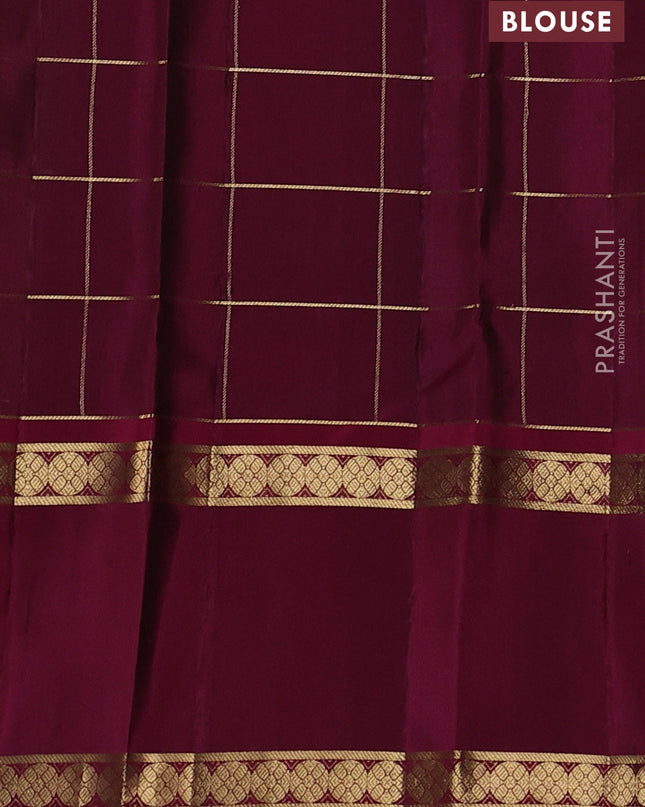 Pure soft silk saree green and magenta pink with allover zari checks & buttas and rettapet zari woven border