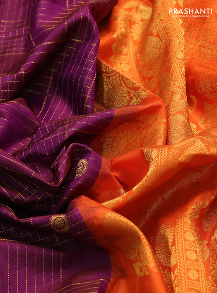 Pure gadwal silk saree purple and orange with allover zari checks & buttas and rettapet zari woven border