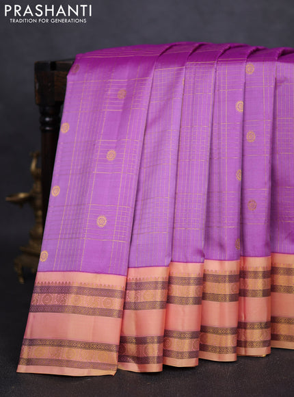 Pure gadwal silk saree lavender and peach shade with allover zari checks & buttas and rettapet zari woven border