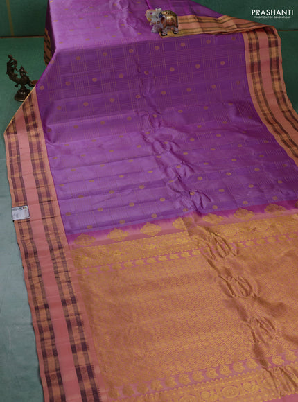 Pure gadwal silk saree lavender and peach shade with allover zari checks & buttas and rettapet zari woven border