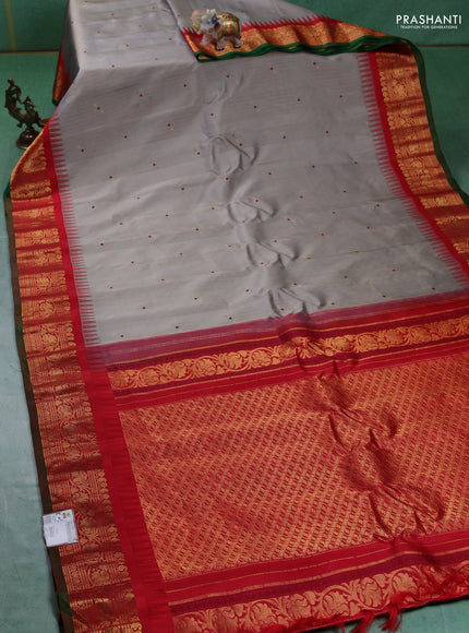 Pure gadwal silk saree grey and red with allover zari weaves and zari woven border