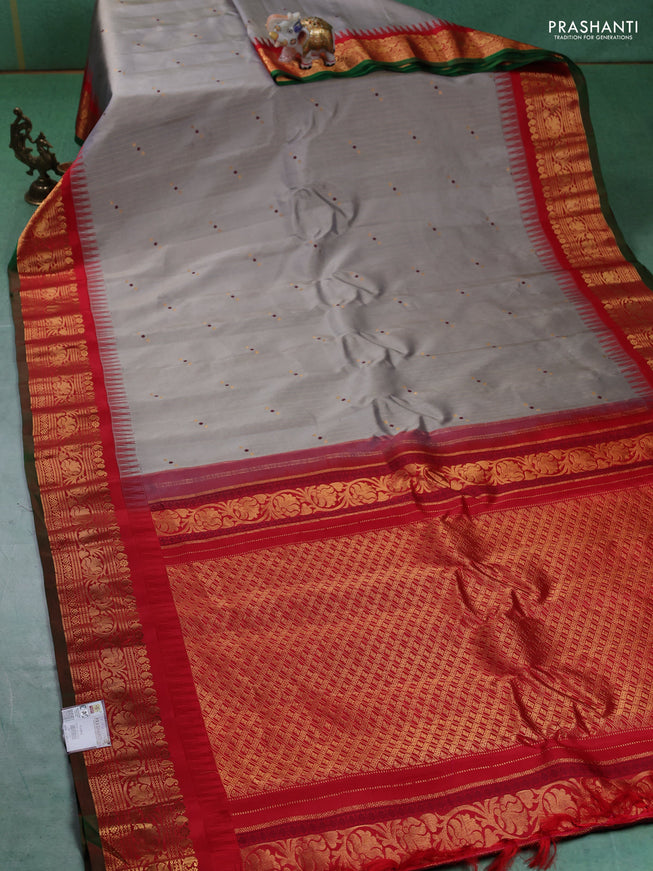 Pure gadwal silk saree grey and red with allover zari weaves and zari woven border
