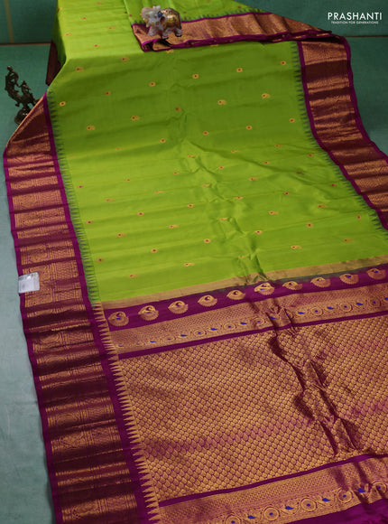 Pure gadwal silk saree light green and purple with zari woven paisley buttas and temple design zari woven border