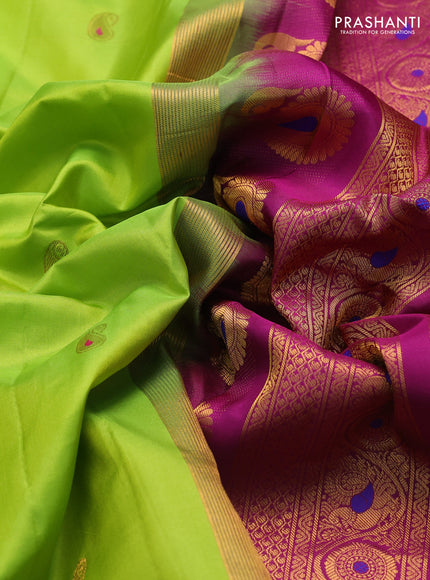 Pure gadwal silk saree light green and purple with zari woven paisley buttas and temple design zari woven border
