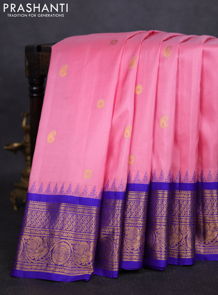 Pure gadwal silk saree pastel pink and blue with zari woven paisley buttas and temple design zari woven border