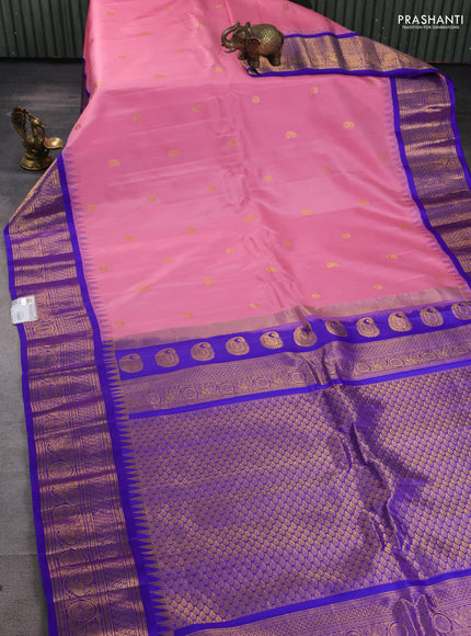 Pure gadwal silk saree pastel pink and blue with zari woven paisley buttas and temple design zari woven border