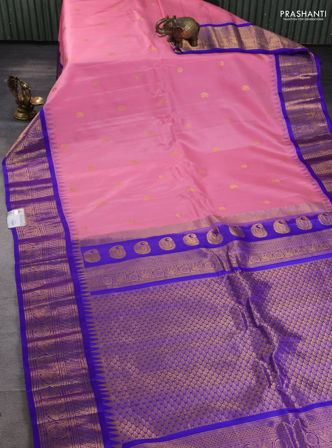 Pure gadwal silk saree pastel pink and blue with zari woven paisley buttas and temple design zari woven border