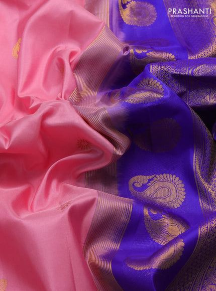 Pure gadwal silk saree pastel pink and blue with zari woven paisley buttas and temple design zari woven border