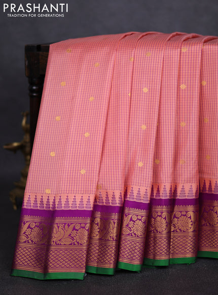 Pure gadwal silk saree peach pink and purple with allover checked pattern and temple design zari woven border