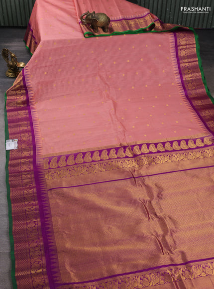 Pure gadwal silk saree peach pink and purple with allover checked pattern and temple design zari woven border