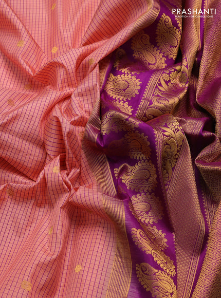 Pure gadwal silk saree peach pink and purple with allover checked pattern and temple design zari woven border