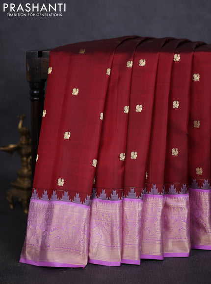 Pure gadwal silk saree maroon and lavender with annam zari woven buttas and temple design zari woven border
