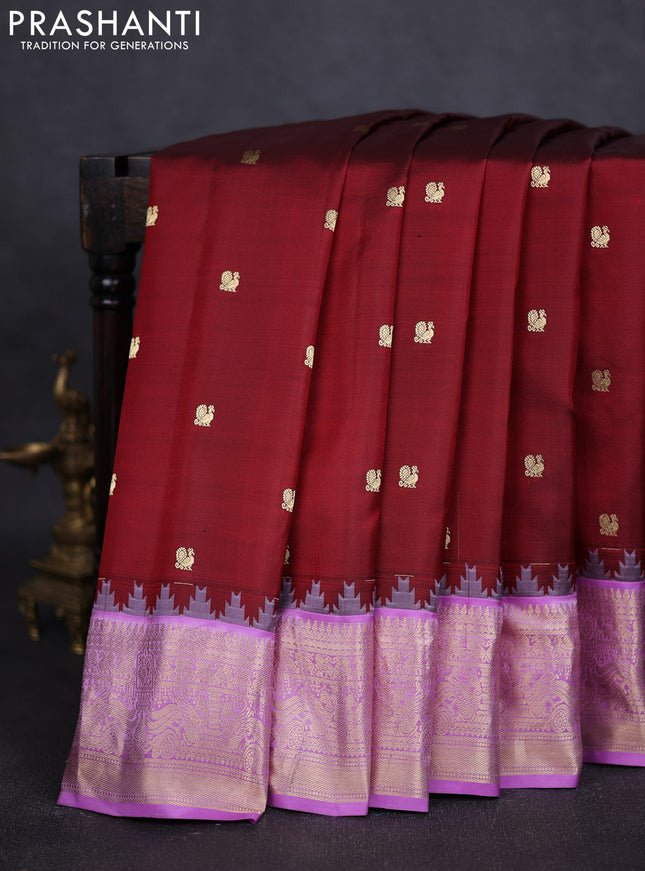 Pure gadwal silk saree maroon and lavender with annam zari woven buttas and temple design zari woven border