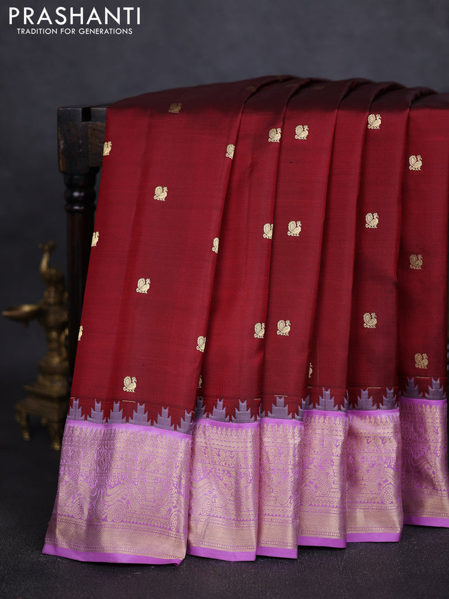 Pure gadwal silk saree maroon and lavender with annam zari woven buttas and temple design zari woven border
