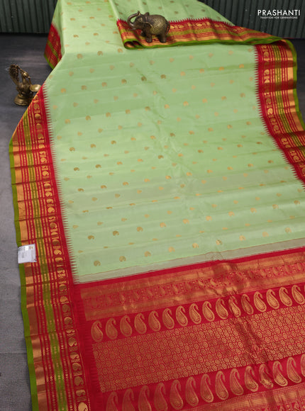 Pure gadwal silk saree pista green and red with zari woven buttas and zari woven border
