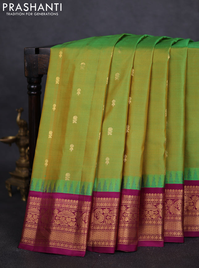 Pure gadwal silk saree dual shade of light green and purple with zari woven buttas and temple design zari woven border