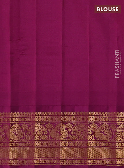 Pure gadwal silk saree dual shade of light green and purple with zari woven buttas and temple design zari woven border