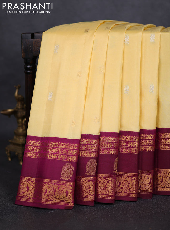 Pure gadwal silk saree pale yellow and purple with silver zari woven buttas and rettapet zari woven border