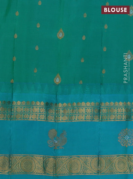 Pure gadwal silk saree blue and teal blue with zari woven buttas and rettapet zari woven border