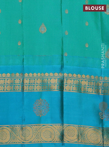 Pure gadwal silk saree pastel pink and teal blue with zari woven buttas and rettapet zari woven border
