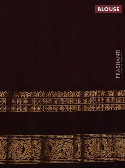 Pure gadwal silk saree sandal and deep maroon with silver & gold zari woven buttas and rettapet zari woven border