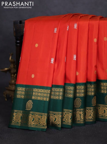 Pure gadwal silk saree orange and green with silver & gold zari woven buttas and rettapet zari woven border