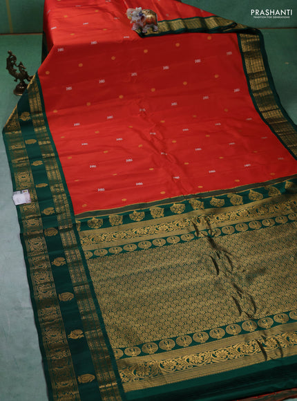 Pure gadwal silk saree orange and green with silver & gold zari woven buttas and rettapet zari woven border