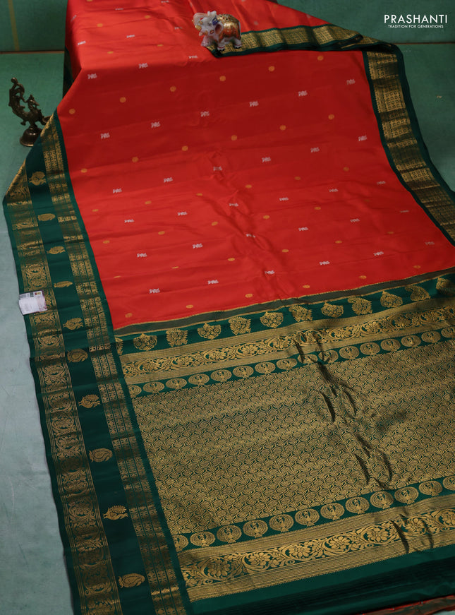 Pure gadwal silk saree orange and green with silver & gold zari woven buttas and rettapet zari woven border