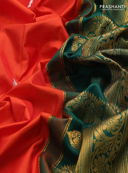 Pure gadwal silk saree orange and green with silver & gold zari woven buttas and rettapet zari woven border