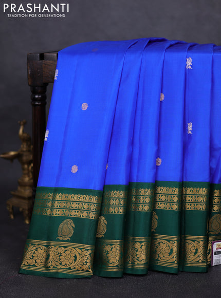 Pure gadwal silk saree royal blue and green with silver & gold zari woven buttas and rettapet zari woven border