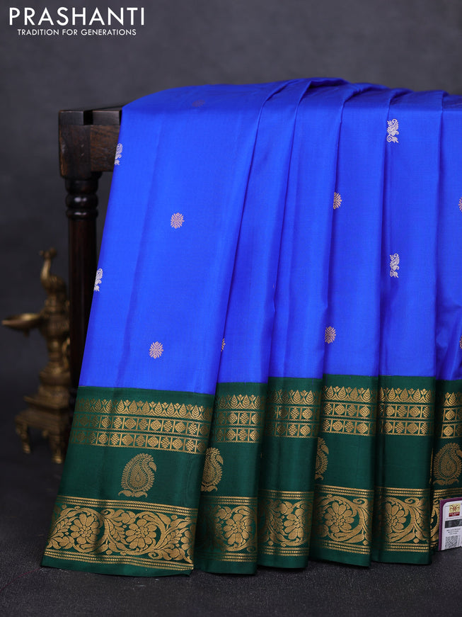 Pure gadwal silk saree royal blue and green with silver & gold zari woven buttas and rettapet zari woven border
