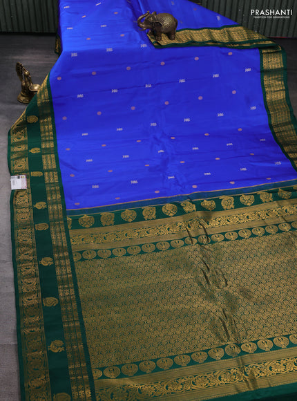 Pure gadwal silk saree royal blue and green with silver & gold zari woven buttas and rettapet zari woven border