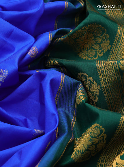 Pure gadwal silk saree royal blue and green with silver & gold zari woven buttas and rettapet zari woven border