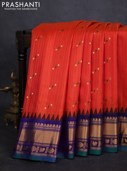 Pure gadwal silk saree orange and blue with allover zari weaves & buttas and zari woven border