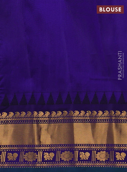 Pure gadwal silk saree orange and blue with allover zari weaves & buttas and zari woven border