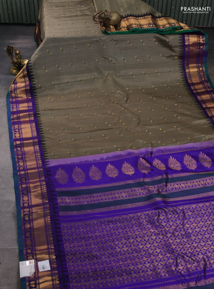 Pure gadwal silk saree greyish green and blue with allover zari weaves & buttas and zari woven border