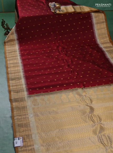 Pure gadwal silk saree maroon and sandal with zari woven buttas and zari woven border