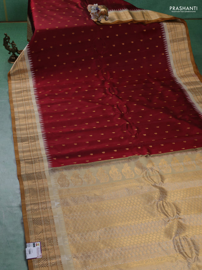 Pure gadwal silk saree maroon and sandal with zari woven buttas and zari woven border