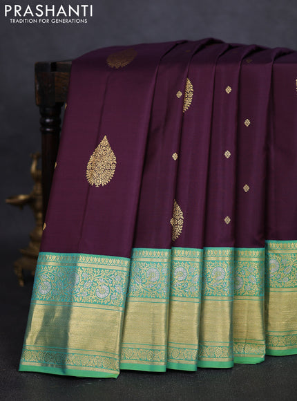 Pure gadwal silk saree deep jamun and green shade with zari woven buttas and zari woven border